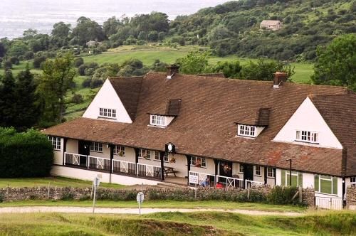 The golf clubhouse at Cleeve Hill, where the sport has been played since 1891.